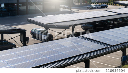 Parking space with solar panels on a roof 118936604