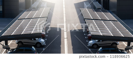 Parking space with solar panels on a roof 118936625
