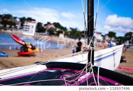 Boat on sea beach 118937496
