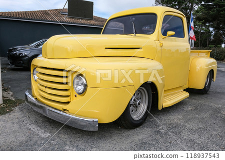 Retro yellow car at french street Retro yellow car at french street 118937543