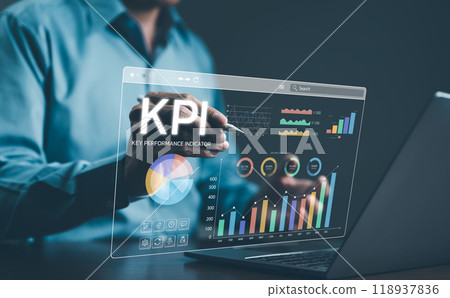 Analyzing Key Performance Indicators. Businessman using digital screen to analyze key performance indicators (KPI) with various graphs and charts, showcasing data analysis and performance tracking. Analyzing Key Performance Indicators. Businessman using digital screen to analyze key performance indicators (KPI) with various graphs and charts, showcasing data analysis and performance tracking. 118937836