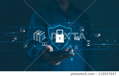 Cybersecurity Concept. A person holds a smartphone displaying a shield with a lock symbol, surrounded by various cyber security icons, representing user privacy, and data encryption. Secure technology 118937847