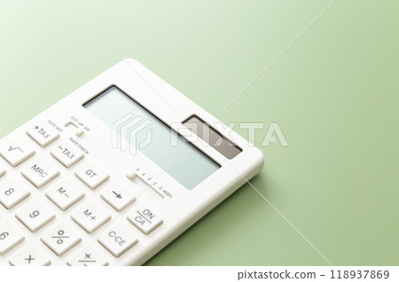 Calculator on a green background 118937869