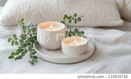 Cozy candle display with minimalistic decor for a calming atmosphere in soft lighting. 118938788