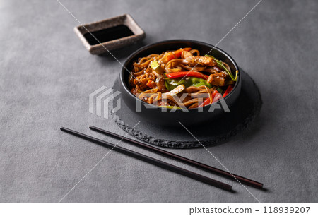 Stir-fry with soba noodles, meat and vegetables. Asian fast and healthy food Stir-fry with soba noodles, meat and vegetables. Asian fast and healthy food 118939207