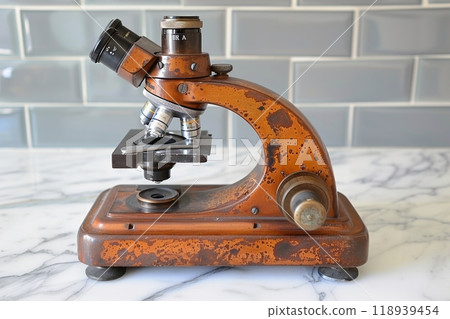 Vintage microscope utilized in medical office for diagnostic and research purposes Vintage microscope utilized in medical office for diagnostic and research purposes 118939454