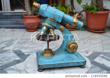 Antique microscope utilized in medical practice at doctor s office for historical observations Antique microscope utilized in medical practice at doctor s office for historical observations 118939566