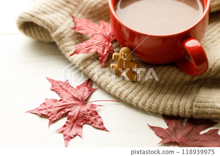 Hot chocolate drink in a red cup. Autumn Winter composition 118939975