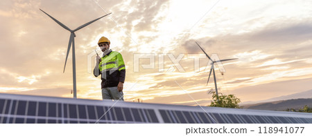 Professional Man Energy Engineer Holding the Solar Panel. Alternative energy engineers hold solar panels samples while learning design Professional Man Energy Engineer Holding the Solar Panel. Alternative energy engineers hold solar panels samples while learning design 118941077