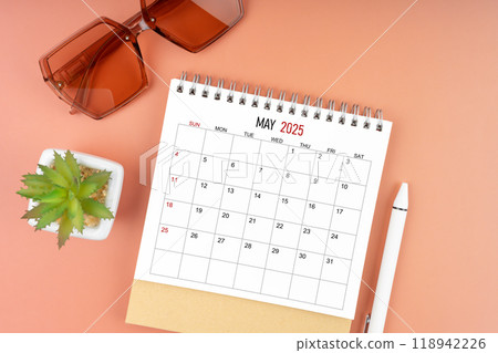 May 2025 desk calendar with brown sunglasses on beautiful background, Appointment concepts. 118942226