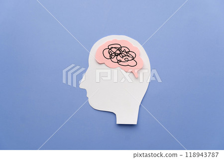 Human head with brain as tangled messy single line on blue background. Concept of mental disorder, ADHD symptom, finding solution, chaotic thinking process, confused mind. Mental health care. 118943787