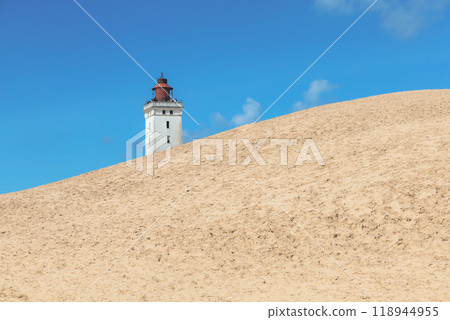 Rubjerg Knude Lighthouse on the coast of the North Sea in the Jutland in northern Denmark. Rubjerg Knude Lighthouse on the coast of the North Sea in the Jutland in northern Denmark. 118944955