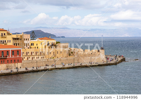 Landmarks of Crete - Panorama View of venetian port of Chania and lighthouse in old harbour of Chania, Greece. Landmarks of Crete - Panorama View of venetian port of Chania and lighthouse in old harbour of Chania, Greece. 118944996