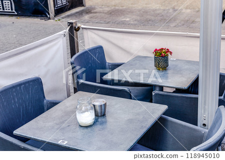 Summer restaurant on the city street. Outdoor cafe. 118945010