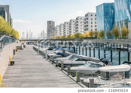 Yacht parking. A marina lot. Yacht and sailboat is moored at the quay. 118945014