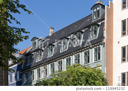 Downtown Copenhagen with old colored houses on a sunny day. 118945232