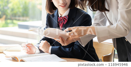 Exam takers/high school girls taking classes at cram school 118945946