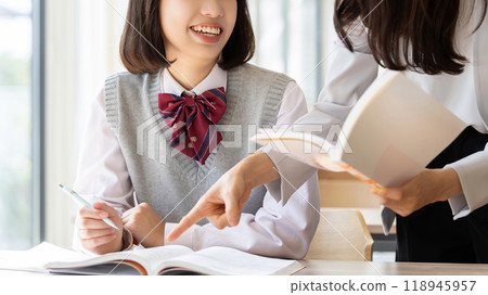 Exam takers/high school girls taking classes at cram school 118945957