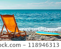 Sunny Seaside Retreat: sun loungers under palm tree on beautiful coastal beach. 118946313