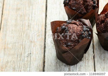 Sweet Baked chocolate muffins ( cupcake )  . Top view Sweet Baked chocolate muffins ( cupcake )  . Top view 118946897
