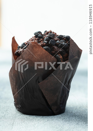 Sweet Baked chocolate muffins ( cupcake ) . Top view Sweet Baked chocolate muffins ( cupcake ) . Top view 118946915