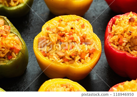 Baked stuffed pepper ( paprika ) with rice , carrot and meat . Top view on rustic background 118946950