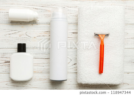 shaving man set. shaving machine, towel, lotion and shaving foam on colored background. Men bath Accessories top view 118947344