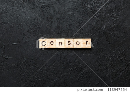 Censor word written on wood block. Censor text on cement table for your desing, concept 118947364