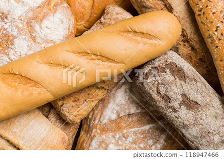 Homemade natural breads. Different kinds of fresh bread as background, top view with copy space 118947466