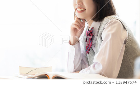 Exam takers/high school girls in uniform Exam takers/high school girls in uniform 118947574
