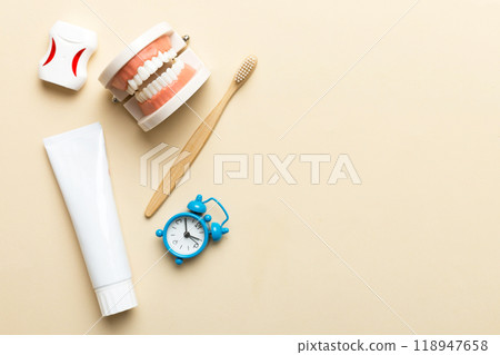 Mouthwash and other oral hygiene products on colored table top view with copy space. Flat lay. Dental hygiene. Oral care kit. Dentist concept 118947658