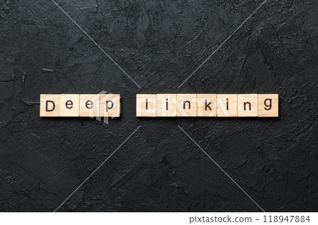 Deep Linking word written on wood block. Deep Linking text on cement table for your desing, concept Deep Linking word written on wood block. Deep Linking text on cement table for your desing, concept 118947884