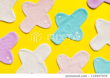 Eco-friendly reusable fabric women's pads. set of colorful bright reusable menstrual pads. zero waste woman periods concept top view with copy space 118947976