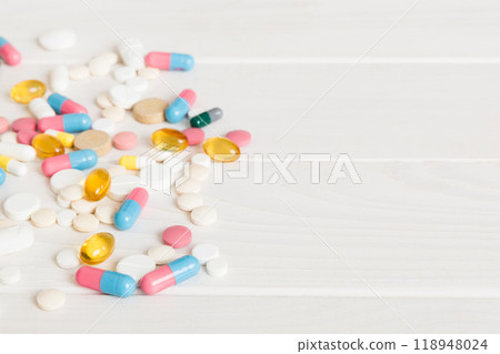 Collection Of Various Medical Tablets And Pills. Assorted pharmaceutical medicine pills, tablets and capsules on table background. Heap of assorted various medicine tablets. Health care Collection Of Various Medical Tablets And Pills. Assorted pharmaceutical medicine pills, tablets and capsules on table background. Heap of assorted various medicine tablets. Health care 118948024