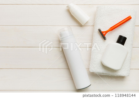 shaving man set. shaving machine, towel, lotion and shaving foam on colored background. Men bath Accessories top view 118948144