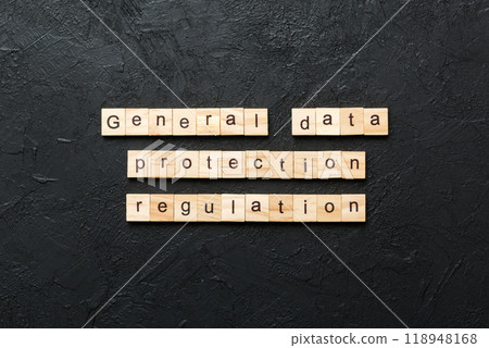 GDPR word written on wood block. General Data Protection Regulation text on cement table for your desing, concept GDPR word written on wood block. General Data Protection Regulation text on cement table for your desing, concept 118948168