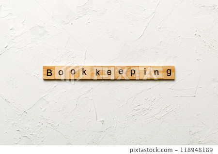 bookkeeping word written on wood block. bookkeeping text on table, concept 118948189