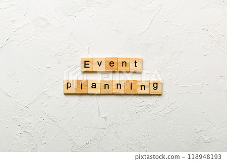 Event planning word written on wood block. Event planning text on table, concept 118948193