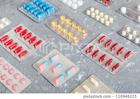 too many different pill of various blisters with different pills Medicines storage at home concept Medication storing. A pile of medicine in blister packs. Pharmaceutical blister packs too many different pill of various blisters with different pills Medicines storage at home concept Medication storing. A pile of medicine in blister packs. Pharmaceutical blister packs 118948225