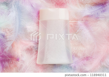 Spa cosmetic product, cream bottle, branding mock up, top view with feathers background. Flat lay 118948311