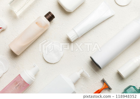 Mockup for bathing products top view flat lay, spa razor, toothpaste, soap, gel and other various accessories. Cosmetics for skin health. Bath Mockup for your logo Mockup for bathing products top view flat lay, spa razor, toothpaste, soap, gel and other various accessories. Cosmetics for skin health. Bath Mockup for your logo 118948352