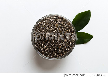 Chia seeds in bowl on colored background. Healthy Salvia hispanica in small bowl. Healthy superfood 118948382