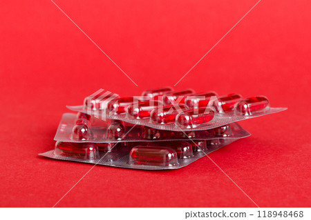 too many different pill cartridges stacked. selective Focus. Packs of blister pills with tablets. Colored pastilles packages. A pile of medicine in blister packs. Pharmaceutical blister packs too many different pill cartridges stacked. selective Focus. Packs of blister pills with tablets. Colored pastilles packages. A pile of medicine in blister packs. Pharmaceutical blister packs 118948468