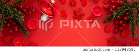 Red Christmas background with fir branches Red Christmas background with fir branches 118948593