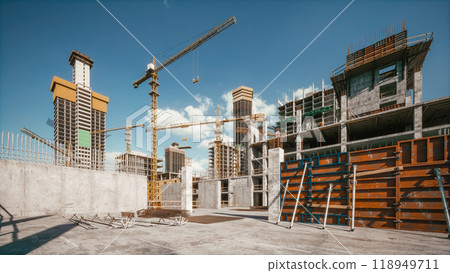 Workers in hard hats work at a construction site. Builders engineers works on construction area 118949711
