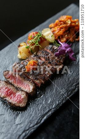 Gourmet Fusion Steak Dish with Asian Inspired Sides for Culinary Art and Restaurant Menu Design 118951710