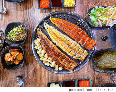 Korean food. Grilled eel. Three flavors. Spicy sauce, salt, soy sauce Korean food. Grilled eel. Three flavors. Spicy sauce, salt, soy sauce 118952192