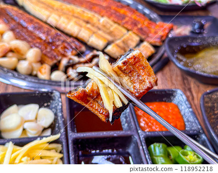 Korean food. Grilled eel. Three flavors. Spicy sauce, salt, soy sauce Korean food. Grilled eel. Three flavors. Spicy sauce, salt, soy sauce 118952218