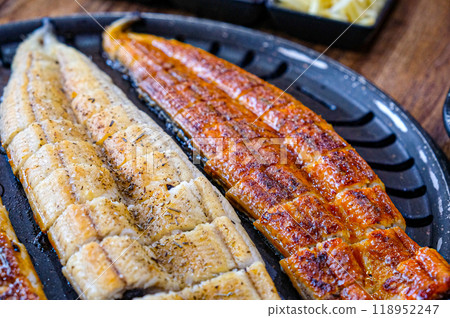 Korean food. Grilled eel. Three flavors. Spicy sauce, salt, soy sauce Korean food. Grilled eel. Three flavors. Spicy sauce, salt, soy sauce 118952247