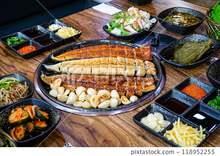 Korean food. Grilled eel. Three flavors. Spicy sauce, salt, soy sauce Korean food. Grilled eel. Three flavors. Spicy sauce, salt, soy sauce 118952255